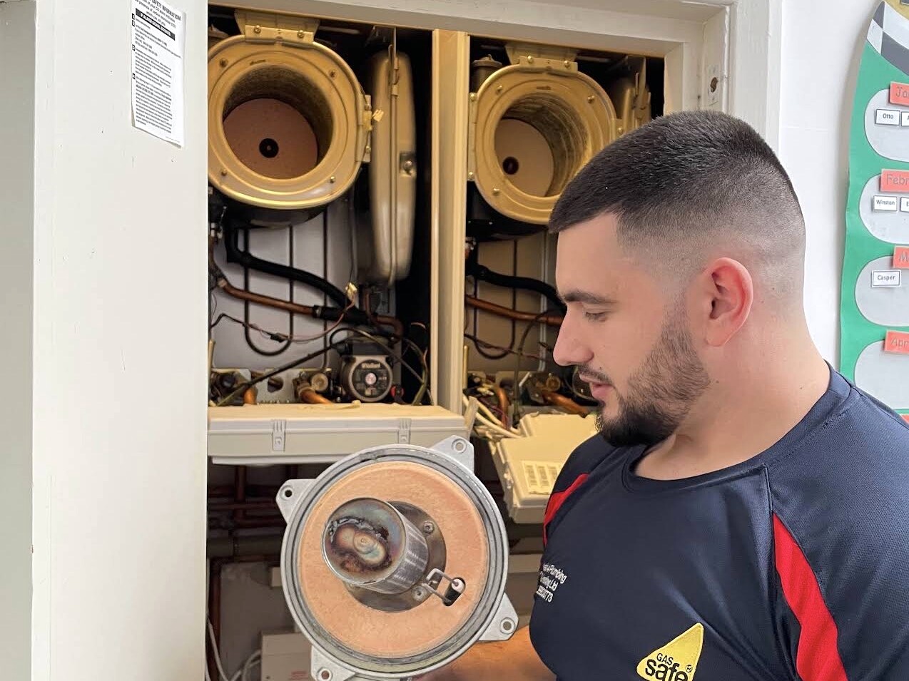West 4 Gas Safe engineer servicing a boiler in Chiswick W4